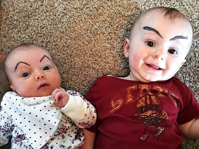 Babies With Eyebrows Drawn On Their Faces