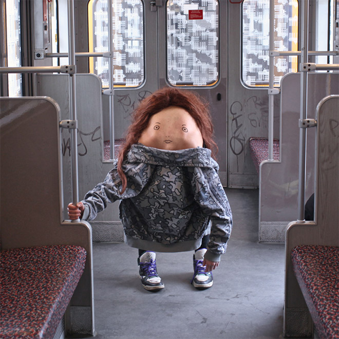 Creepy body art creature in the bus.