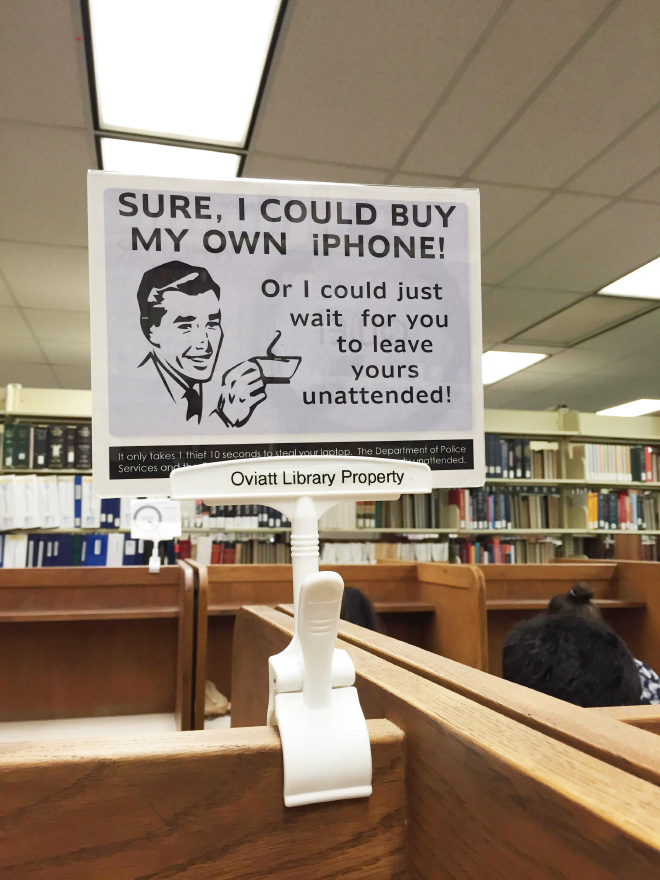 Brilliant library warning sign.