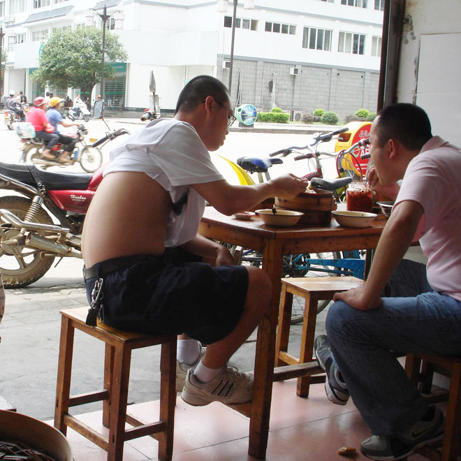 Man wearing a Beijing bikini.