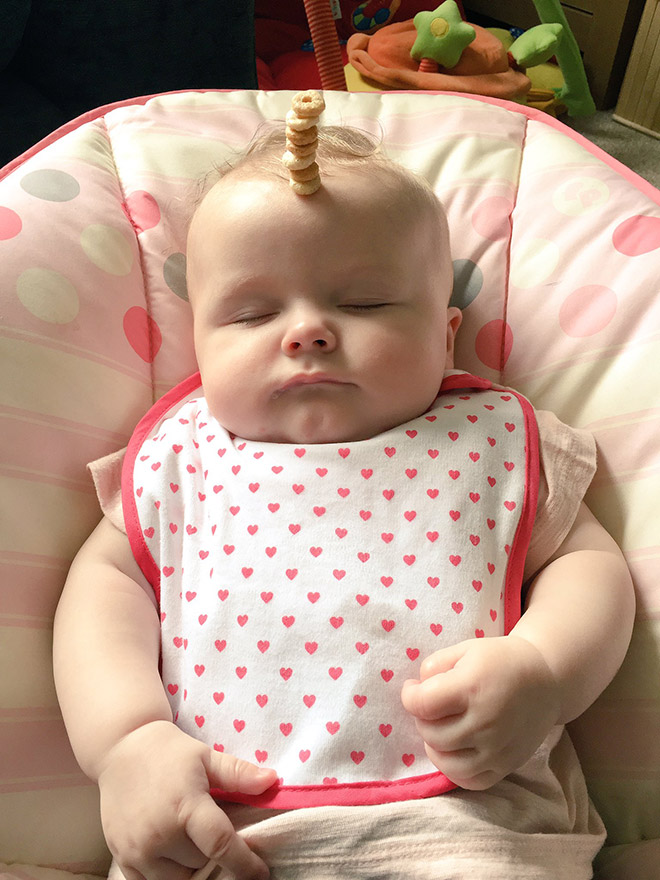 Weird viral trend: stacking Cheerio on babies.
