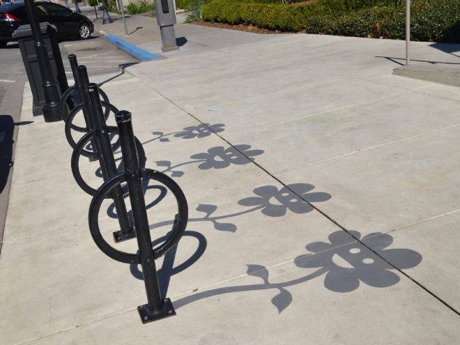 Fake shadow painted by a street artist to confuse people.