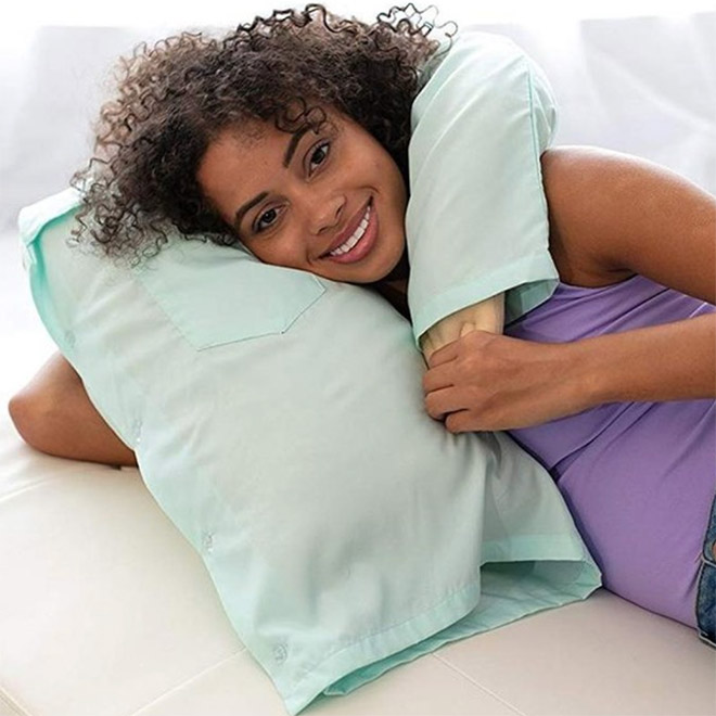 Lonely woman with a "boyfriend pillow".