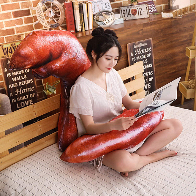 Creepy realistic pig's feet pillow from Japan.