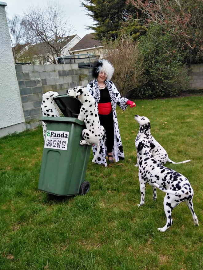 Taking out the trash in a costume.