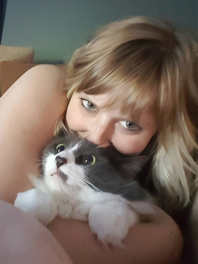 Not all cats like participating in selfies.