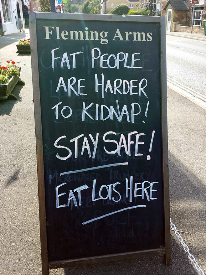 Funny restaurant sidewalk sign.