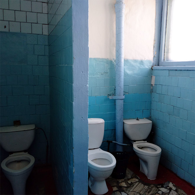 An actual toilet in a Russian school.