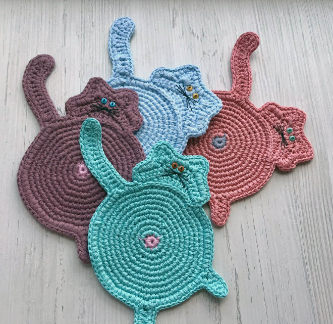Crochet cat butt coasters.