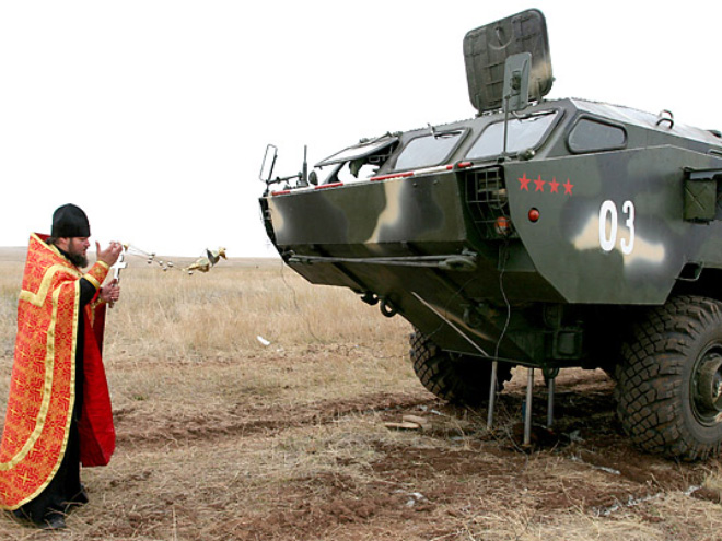 Russian priests really love blessing weapons.