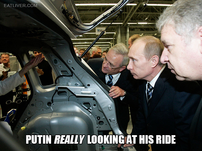 Putin looking at things.